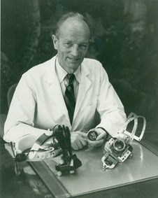 Doctor Charles Schepens with medical instruments