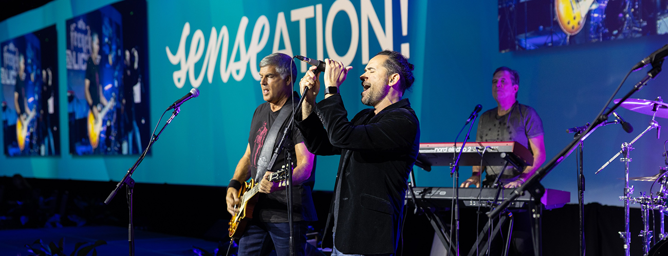 band performing on stage at sense-ation gala