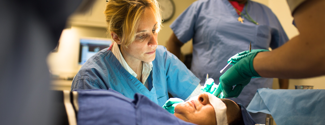 doctor tessa hadlock in operating room with trainees