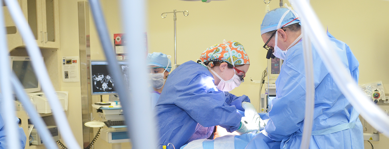 doctor greg randolph in operating room with trainees