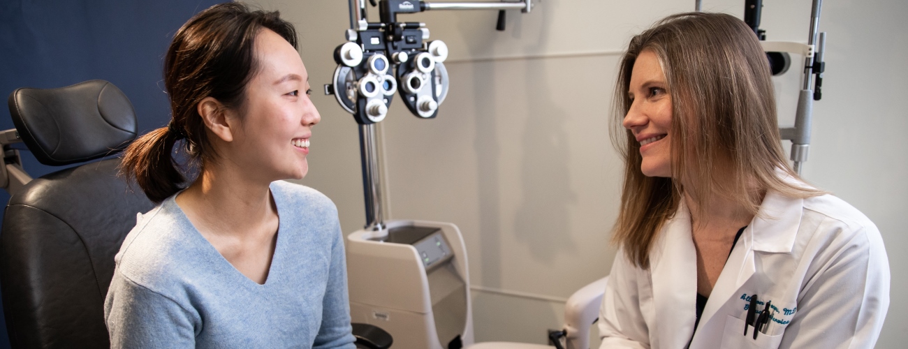 eye specialist consulting with a patient